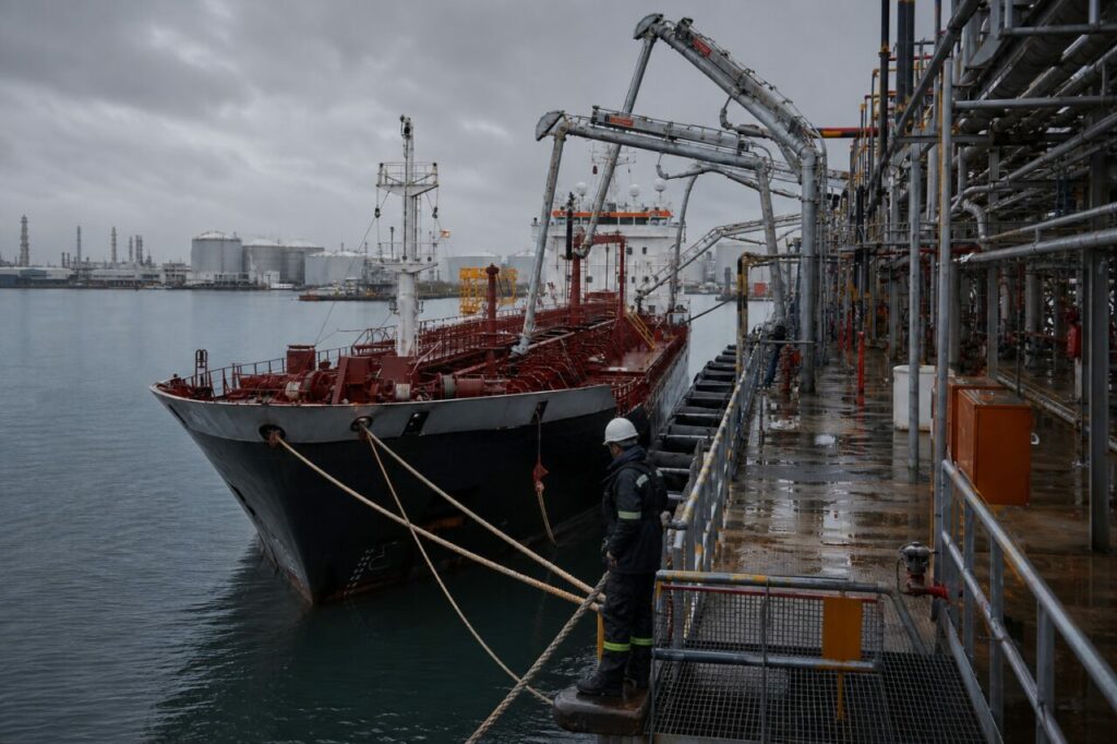 PPE operator monitoring a chemical tanker loading operation